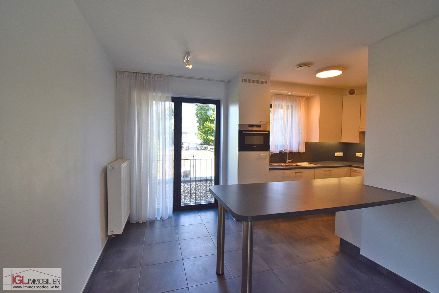 Triplex nieuwbouwappartement met 4 slaapkamers en garage foto 3