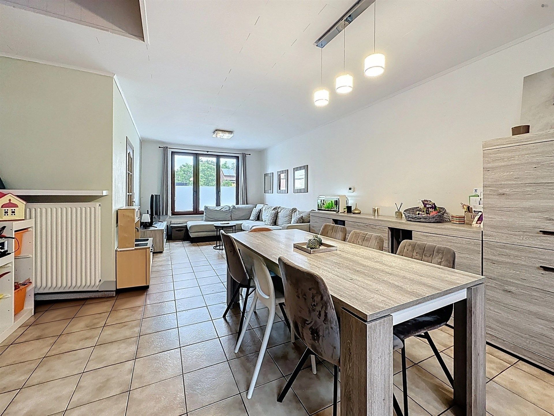 Instapklare woning met 3 slaapkamers en gezellige tuin op perceel van 310m². foto 4