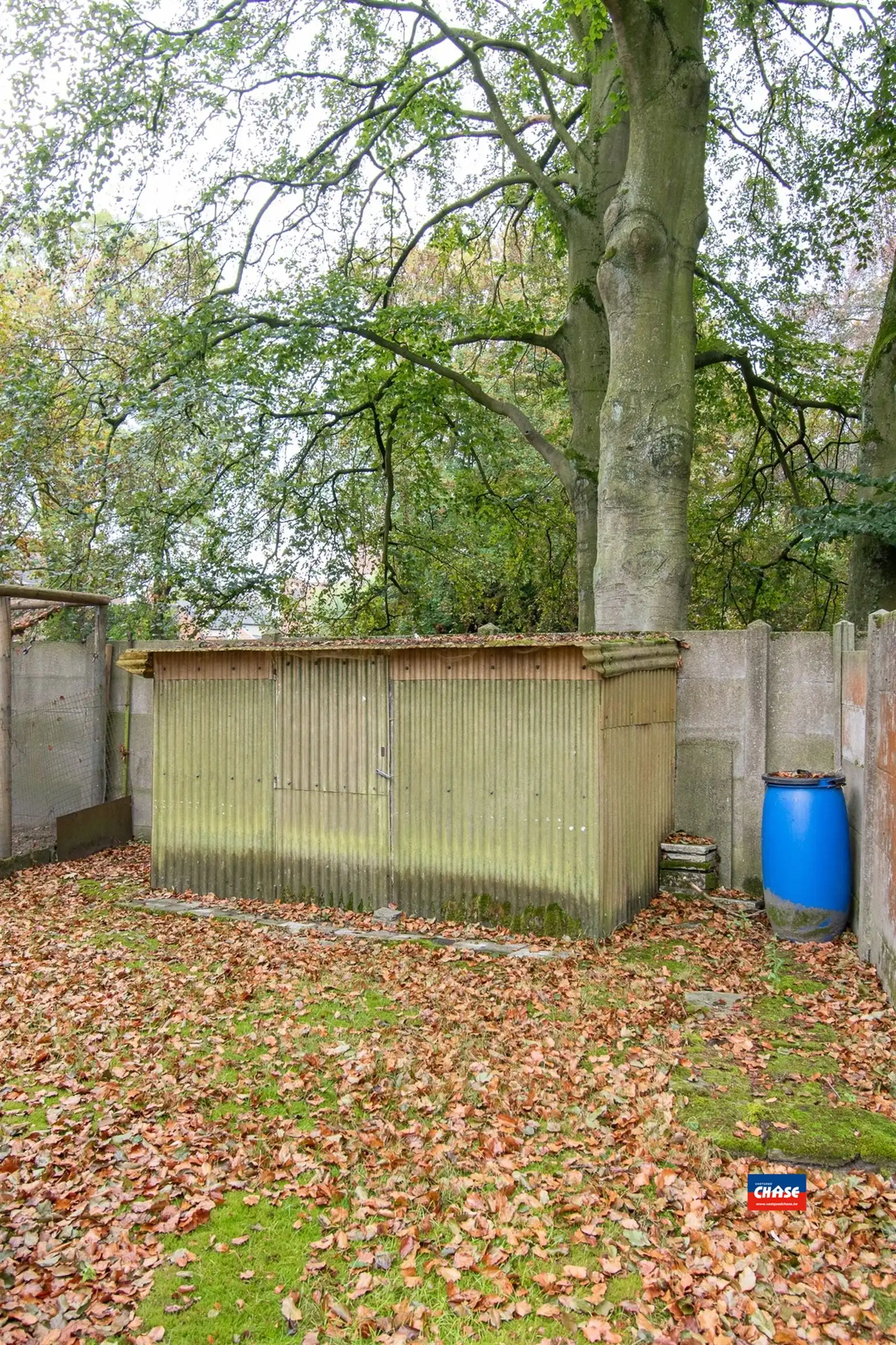 Charmante (op te frissen) rijwoning met 3 à 4 slaapkamers en prachtige tuin foto 15
