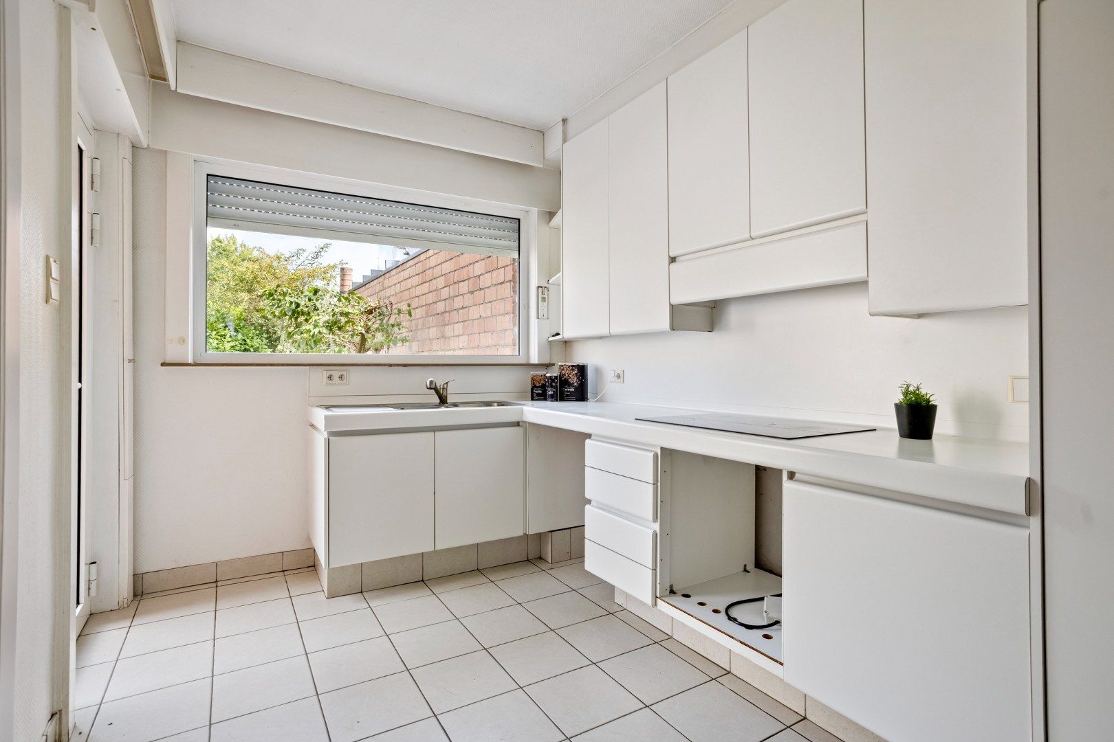 Leuke, halfopen woning met 3 slaapkamers, garage en tuin! foto 10