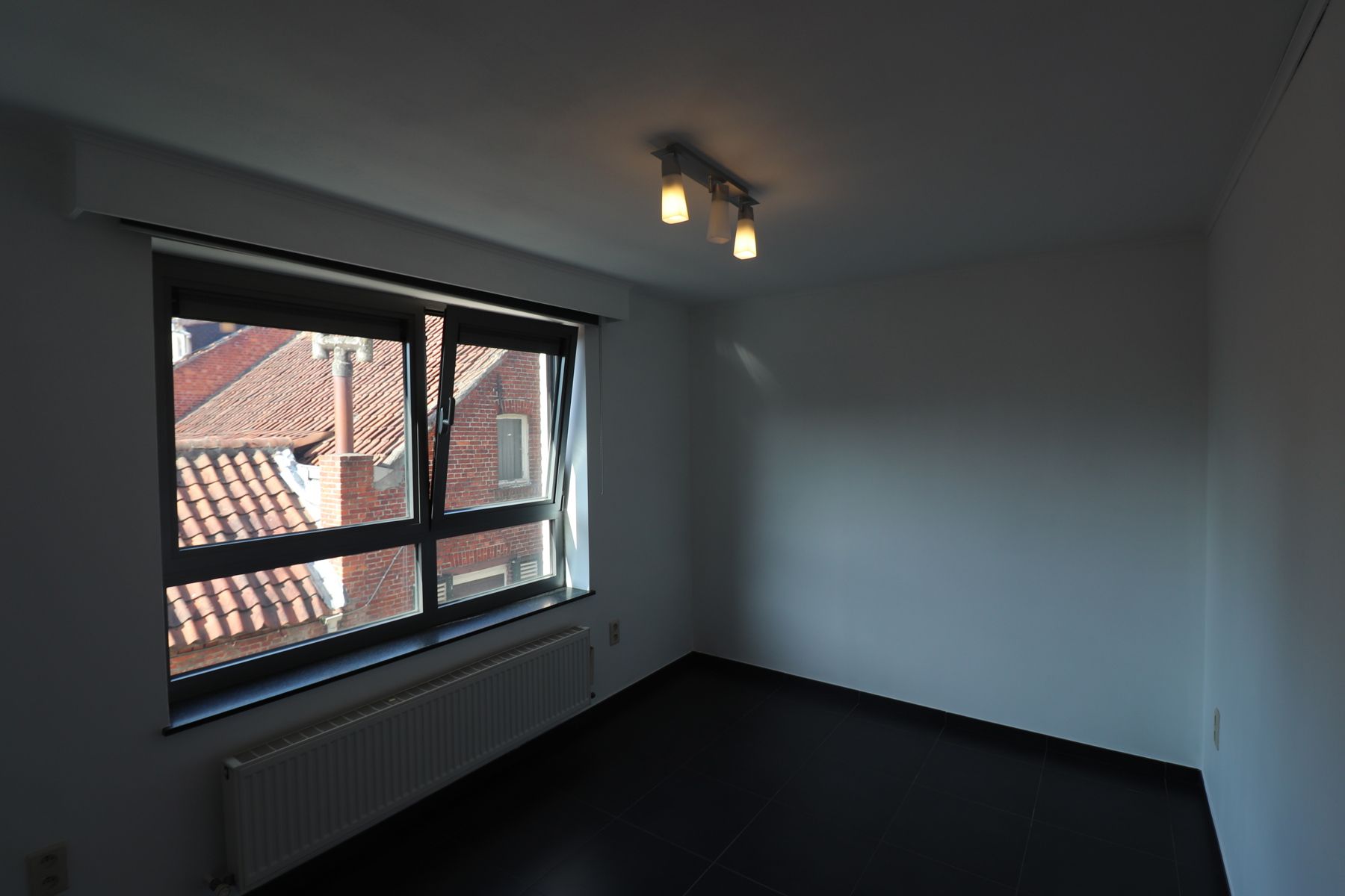 Een appartement op de 1ste verdieping achteraan met 1 slaapkamer en terras. foto 8
