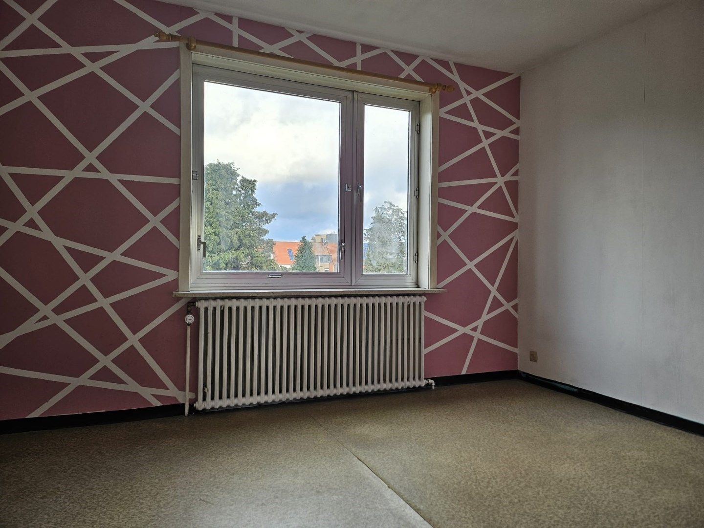 Te vernieuwen hoekappartement met terras in rustige straat in het hartje van Sint-Kruis. foto 9