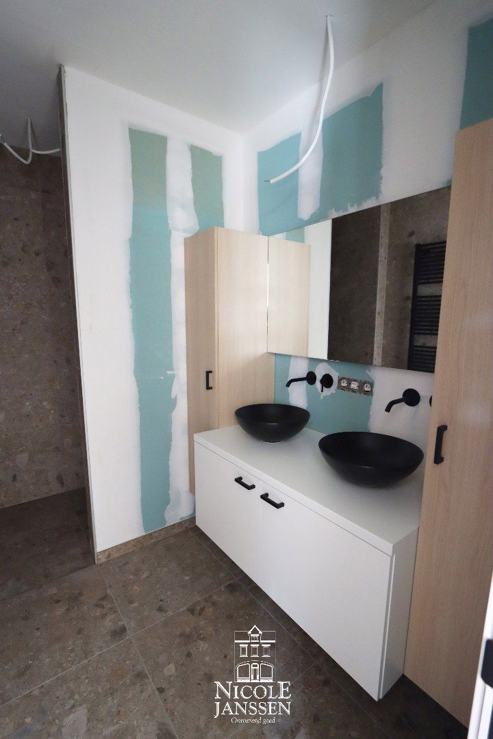 Gelijkvloers nieuwbouwappartement met tuintje en drie autostandplaatsen foto 10