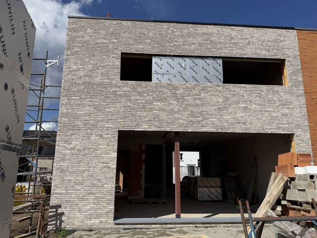 Moderne nieuwbouwwoning met vrijstaande garage en kelder, casco afgewerkt foto 4
