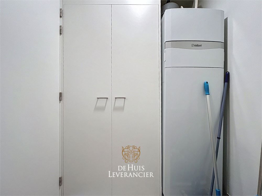 Discrete luxe & tijdloze elegantie : subliem nieuwbouwappartement met terras en gemeenschappelijk tuin te koop in Boechout foto 29