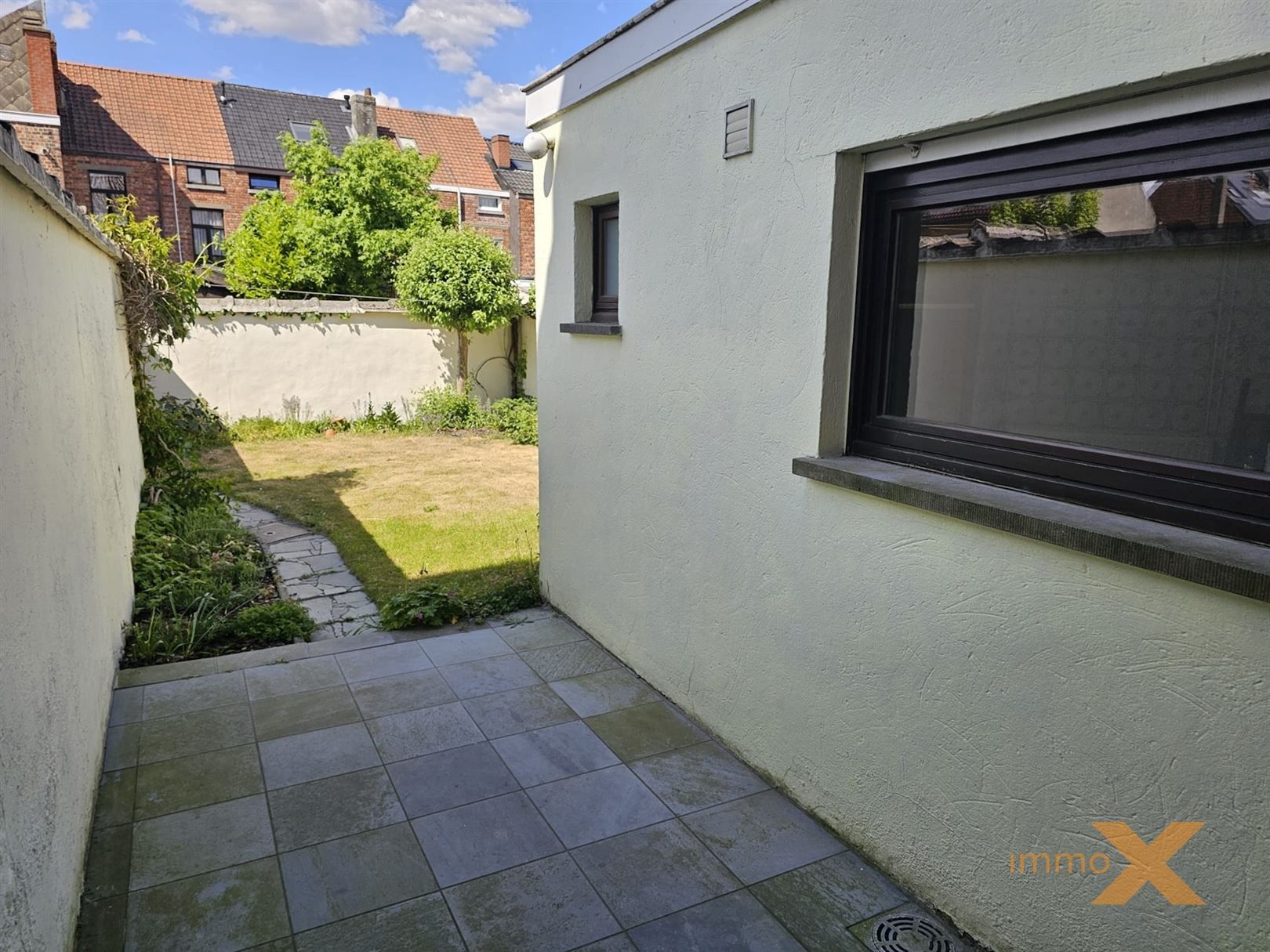 CHARMANTE WONING MET TUIN EN GARAGE foto 7