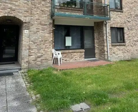 Volledig gerenoveerd gelijkvloers appartement met terras, berging en afgesloten garage foto 14