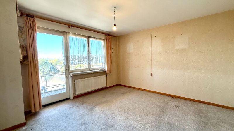 Gezellig en verrassend ruim appartement met 2 slaapkamers en veel potentieel in het hart van Deinze foto 8