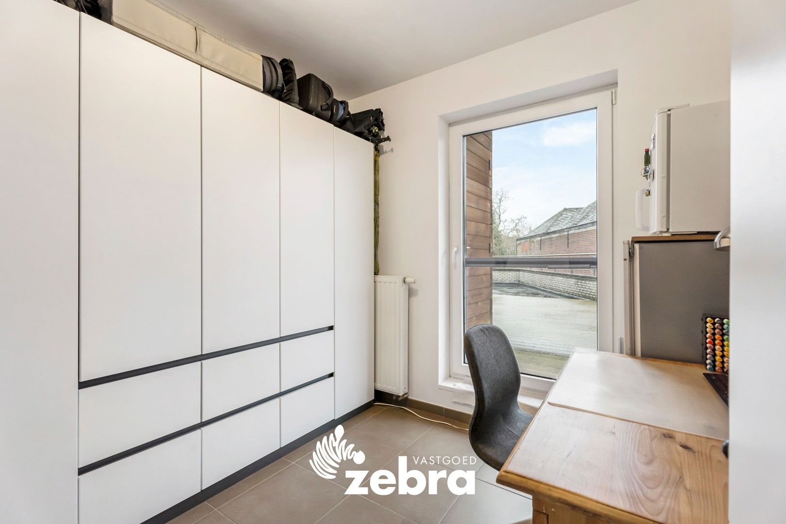 Instapklaar appartement met 2 slaapkamers en ruim terras in hartje Tielt! foto 7