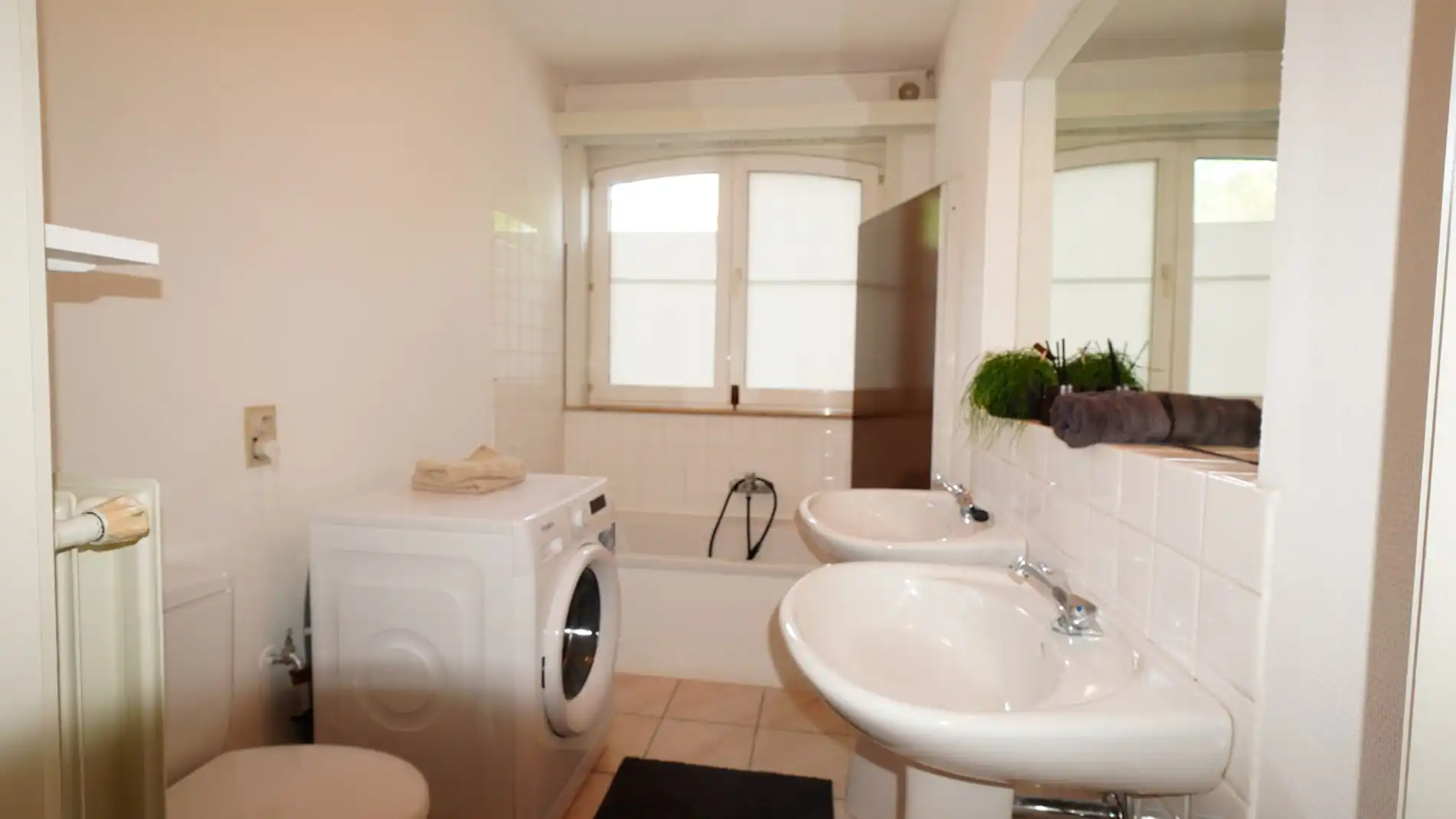 Gelijkvloers appartement met tuin en garagebox foto 5