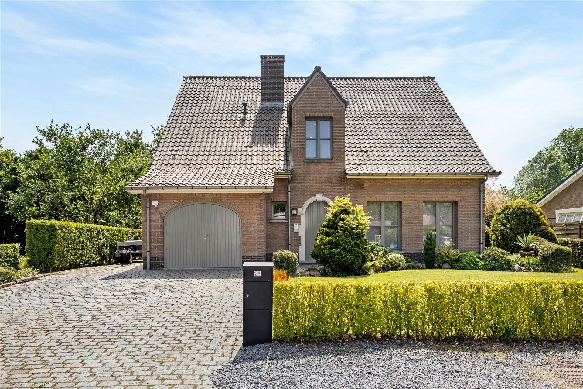 Ruim opgezette gezinswoning met 3 slaapkamers & mooi aangelegde tuin op een perceel van 1.016m² foto 32