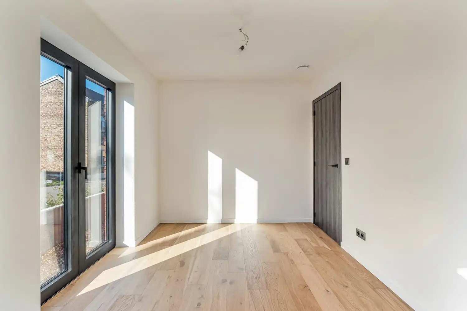 Instapklaar nieuwbouwappartement met 2 slaapkamers, tuin en terras in het centrum van Borgloon foto 12