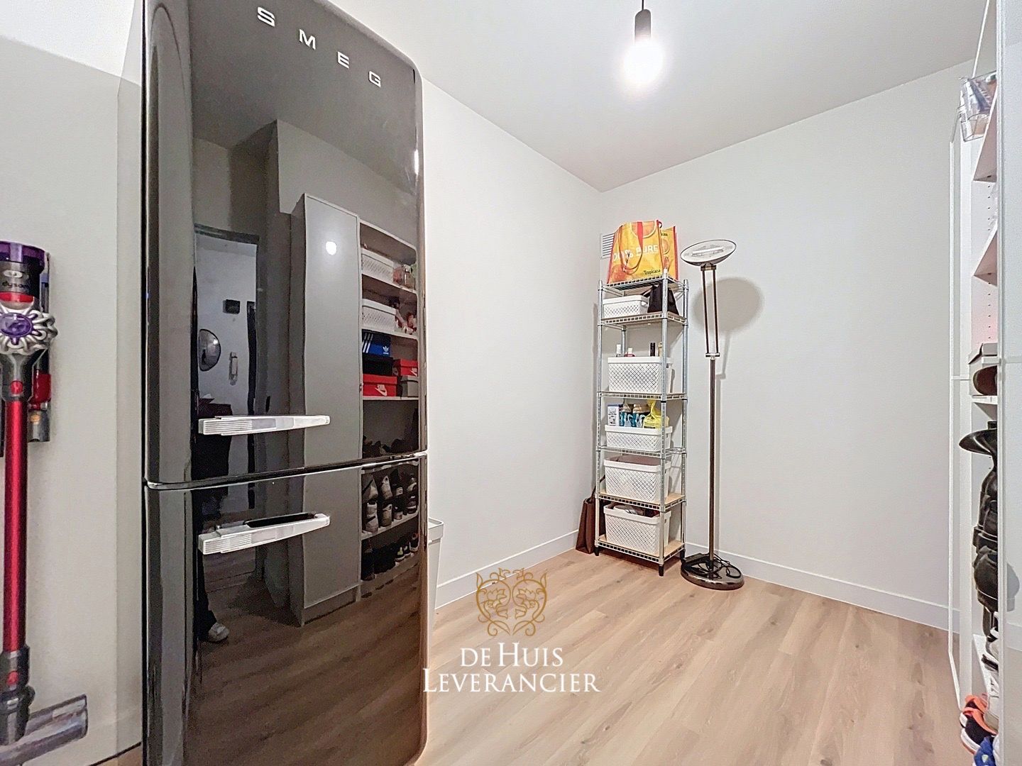 Gerenoveerd appartement met 2 slaapkamers, garagebox en berging te koop in Edegem foto 20