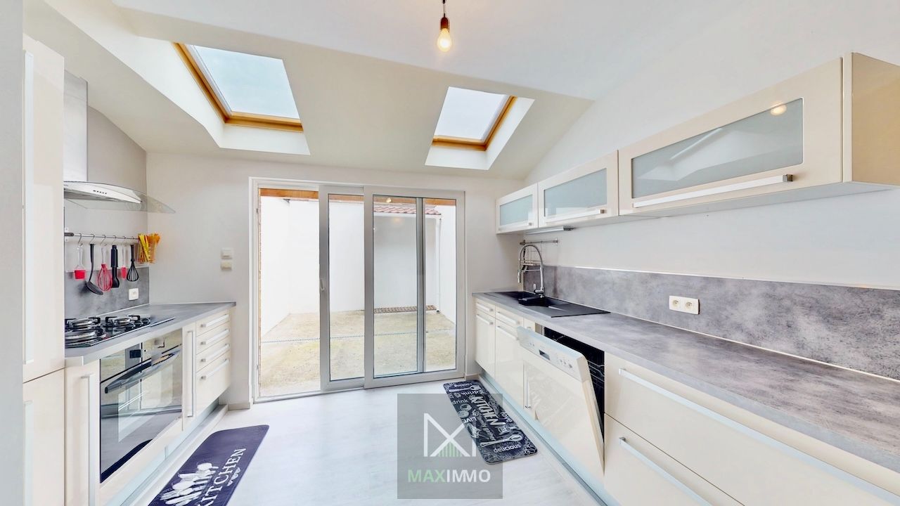 Gerenoveerde woning met 3 slaapkamers en stadstuin foto 6