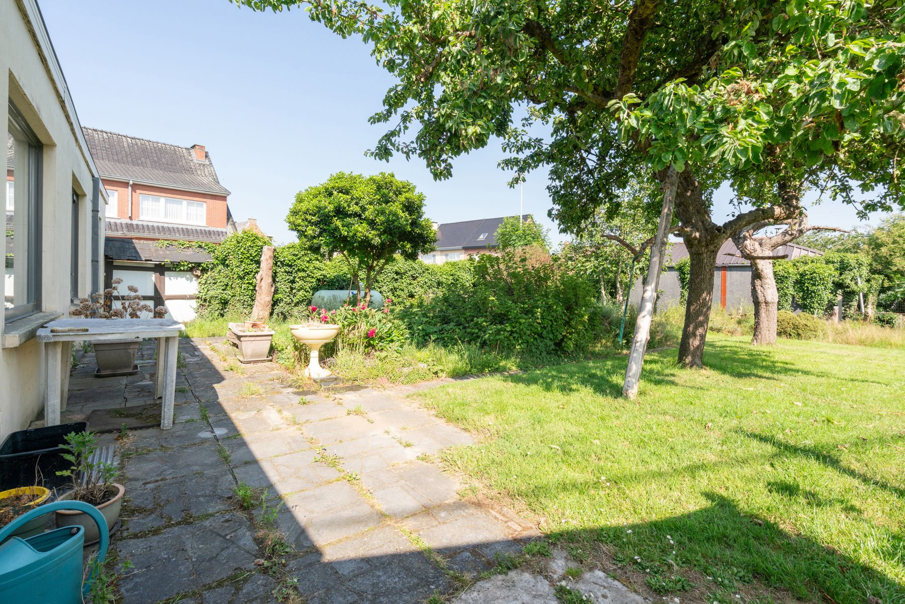 Te renoveren woning met 4 slaapkamers en mooie tuin in het rustige Haaltert foto 20