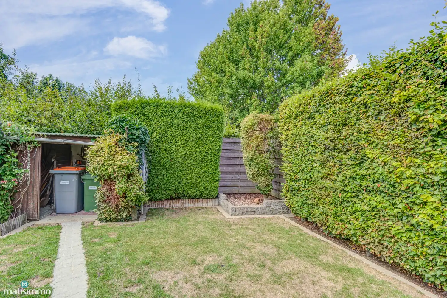 KARAKTERVOLLE EENGEZINSWONING MET 5 SLAAPKAMERS, GARAGE, CARPORT EN TUIN NABIJ HET CENTRUM VAN BILZEN foto 36