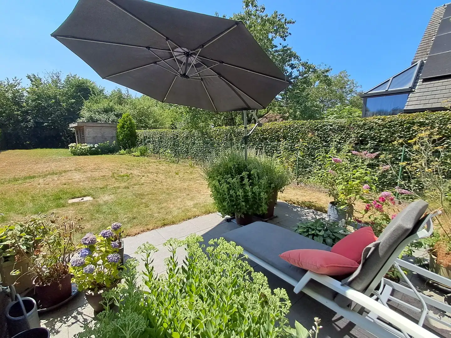 Instapklare halfopen woning met ruime zonnige tuin te Oedelem! foto 21