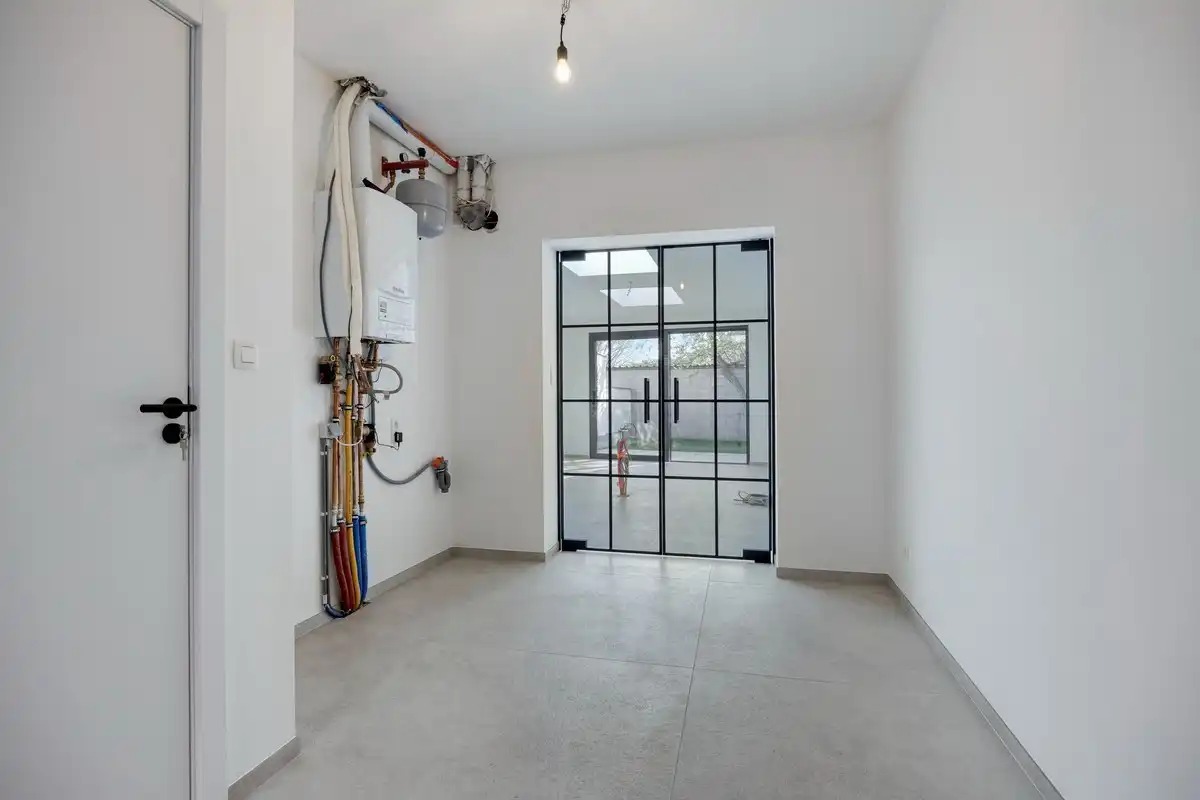 Volledig gerenoveerde woning met 3 slaapkamers, badkamers en tuin in Tienen! – EPC A - bewoonbare opp. 130 m² foto 7