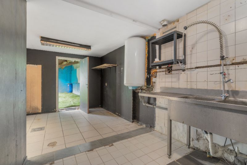 Woning met handelsruimte/bureel foto 9