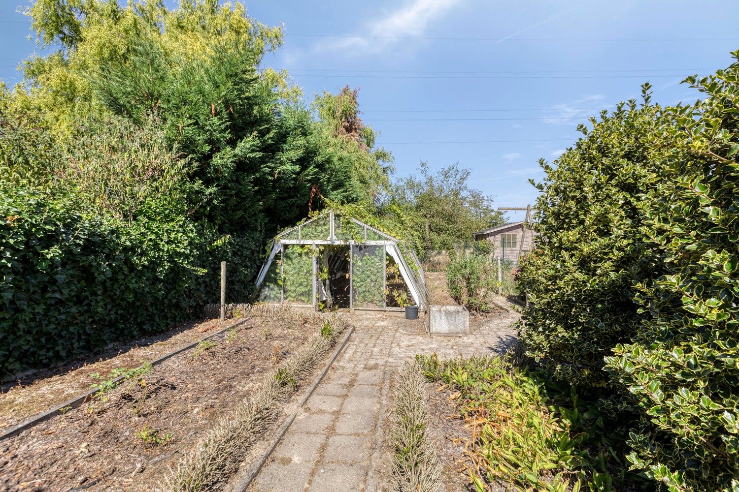 Op te frissen woning met 3 slaapkamers, garage en tuin foto 30