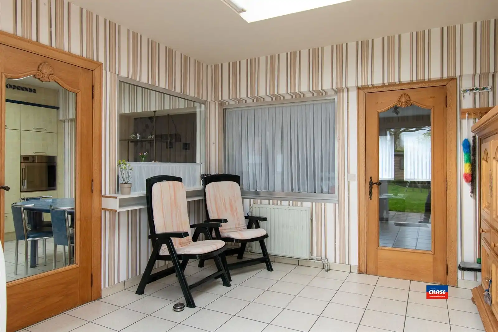 Op te frissen rijwoning met 3 slaapkamers, zolderkamer en gezellige zuid tuin. foto 10