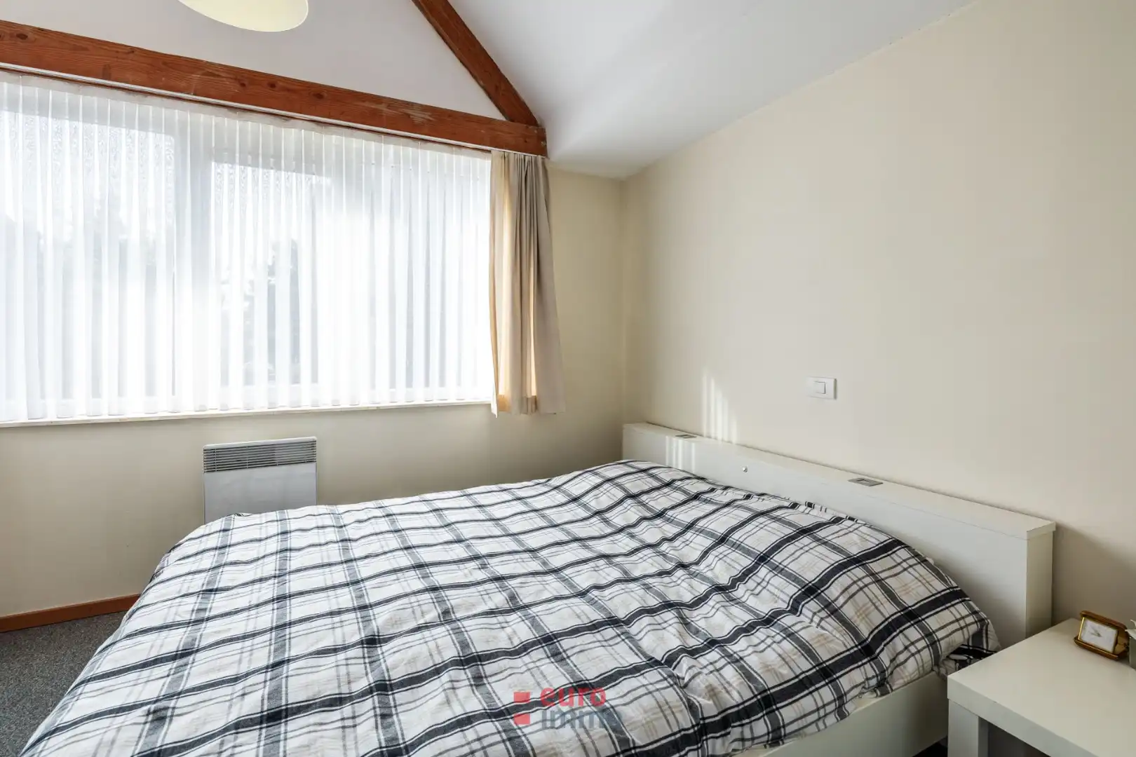 Nabij de havengeul gelegen, zéér gezellige woning met bijhorende parking! foto 8