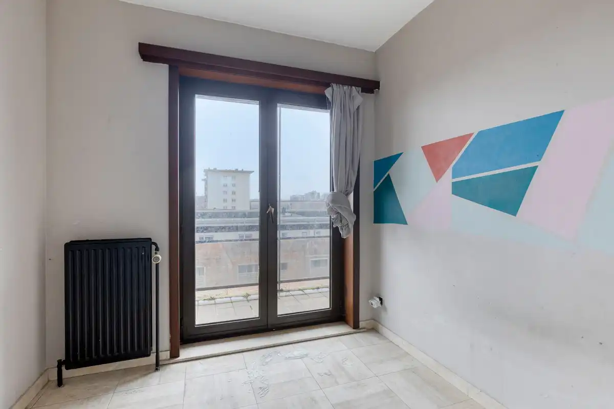 Functioneel en zonnig te renoveren appartement met drie slaapkamers en groot terras foto 11