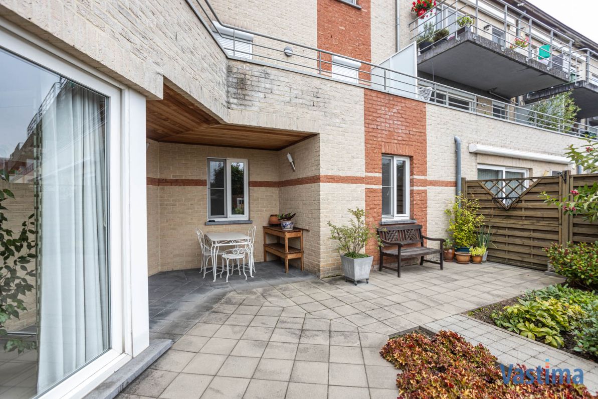 Instapklaar gelijkvloers appartement met tuin en garage foto 18