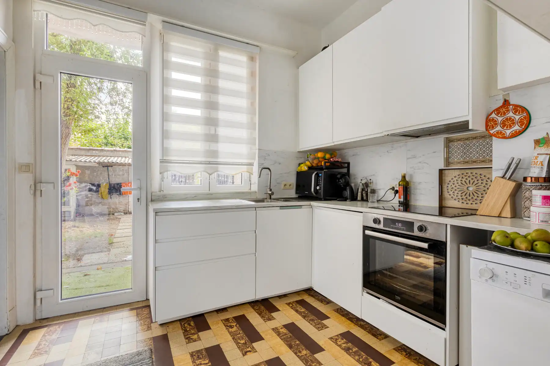 IN OPTIE - Charmant gelijkvloers met tuin en polyvalente kelder. foto 6