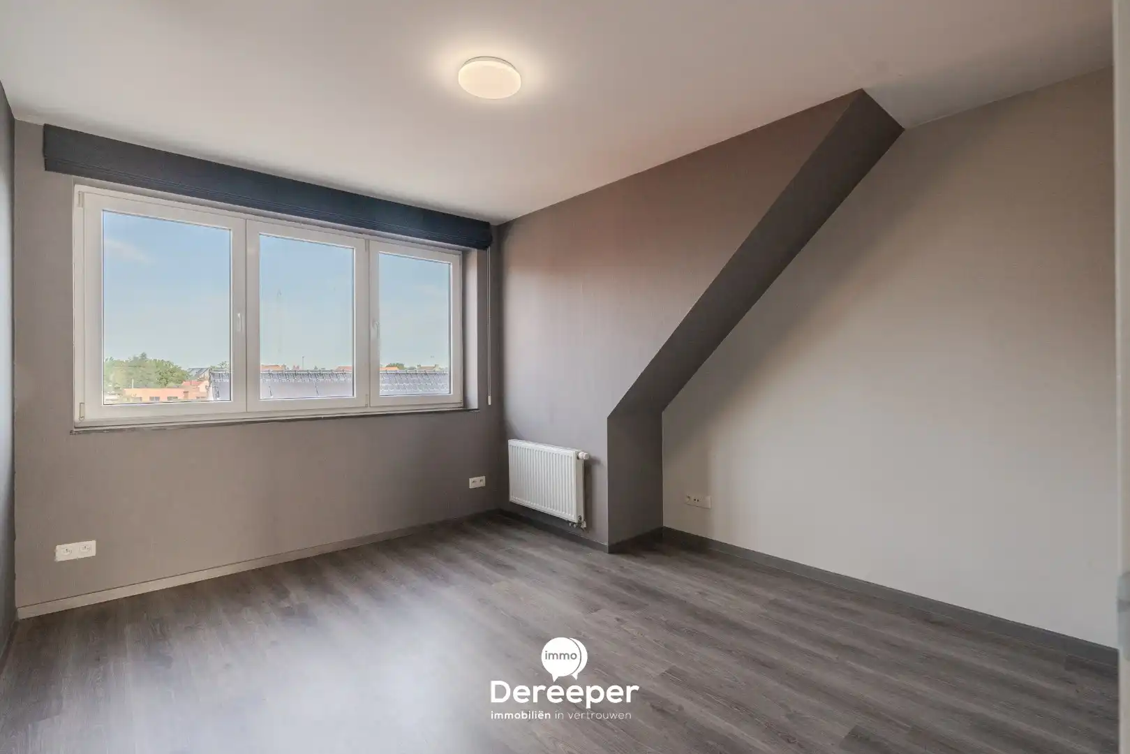 Modern en ruim duplexappartement met 3 slaapkamers in het centrum van Zerkegem foto 6