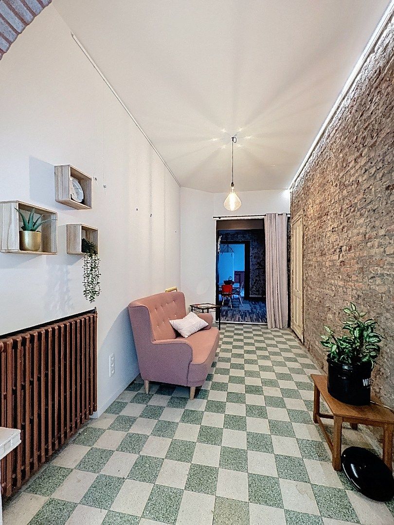 Charmant pand met handelsruimte en woonst in hartje Tienen foto 3