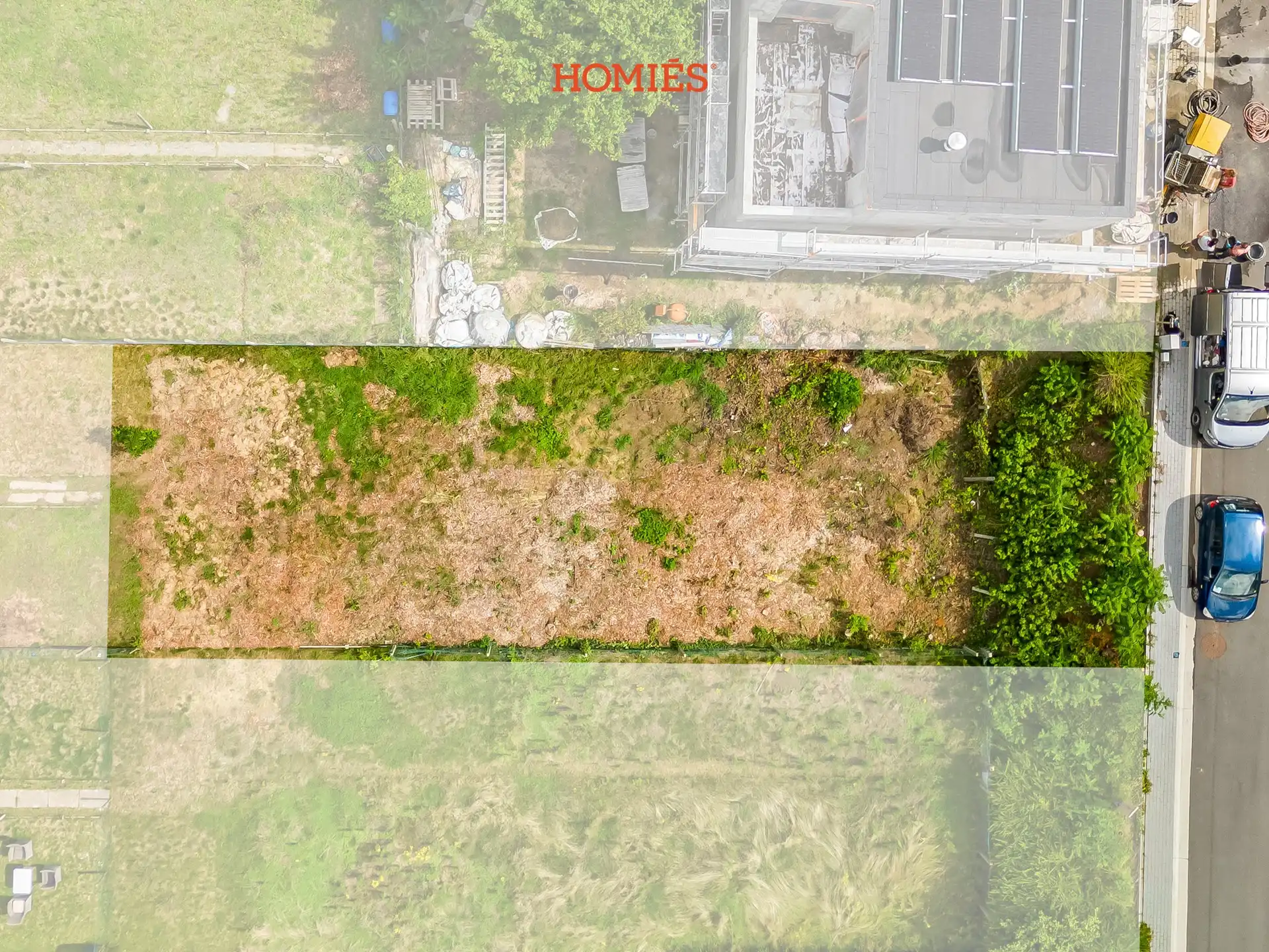 Bouwgrond in verkeersluwe straat foto 3