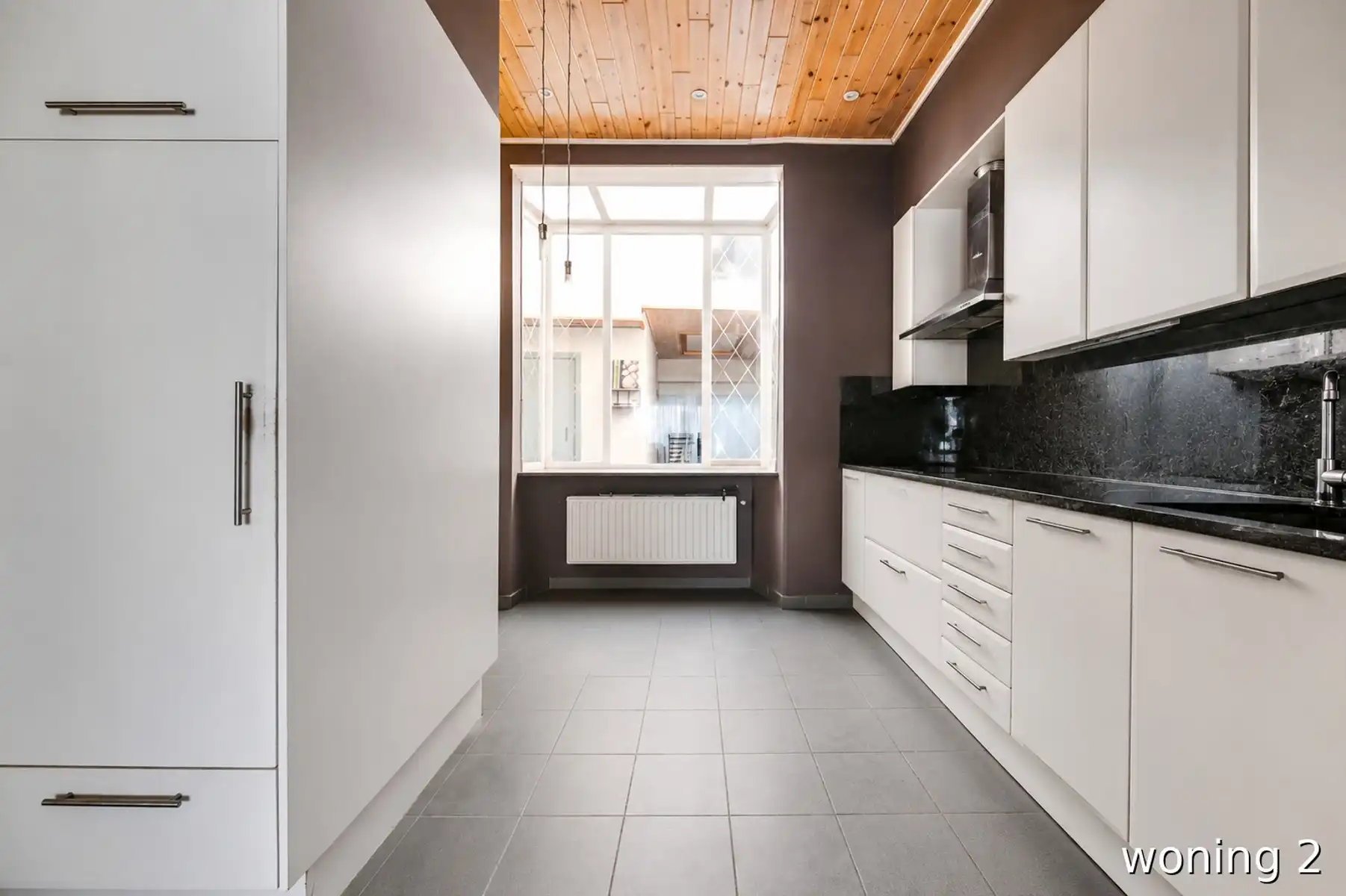 Uniek perceel met 2 volwaardige woningen en gedeelde tuin!  foto 19