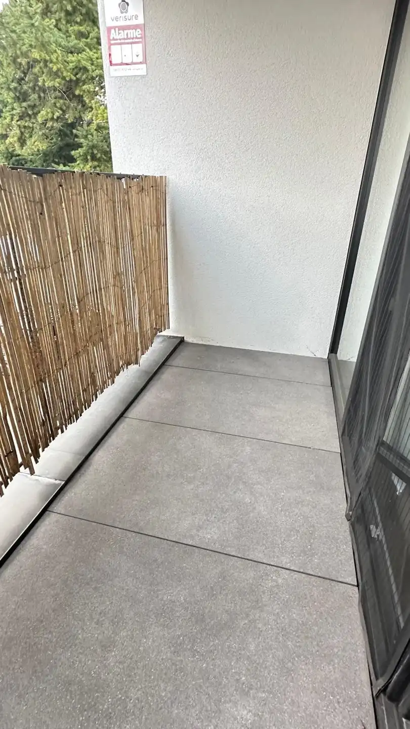 Modern nieuwbouwappartement met terras te huur foto 14