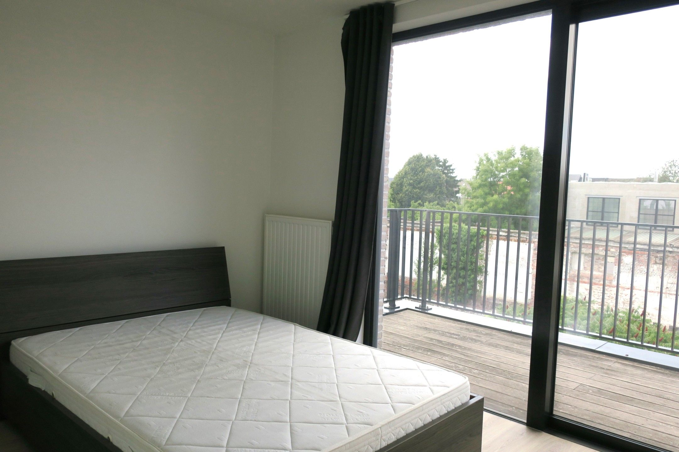Nieuwbouwappartement met 1 slaapkamer, terras en garage foto 12