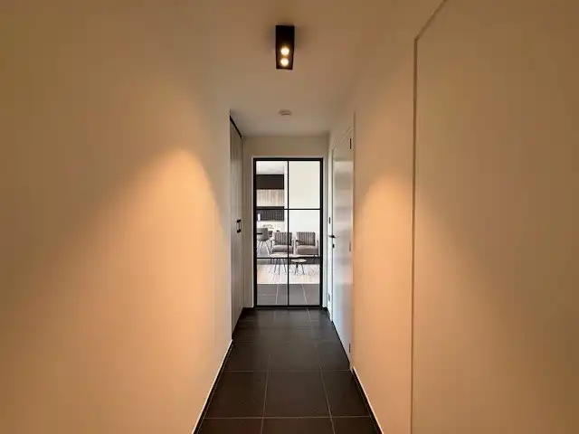 Nieuwbouwappartement met 1 slaapkamer, terras en autostandplaats te Maasmechelen. foto 4