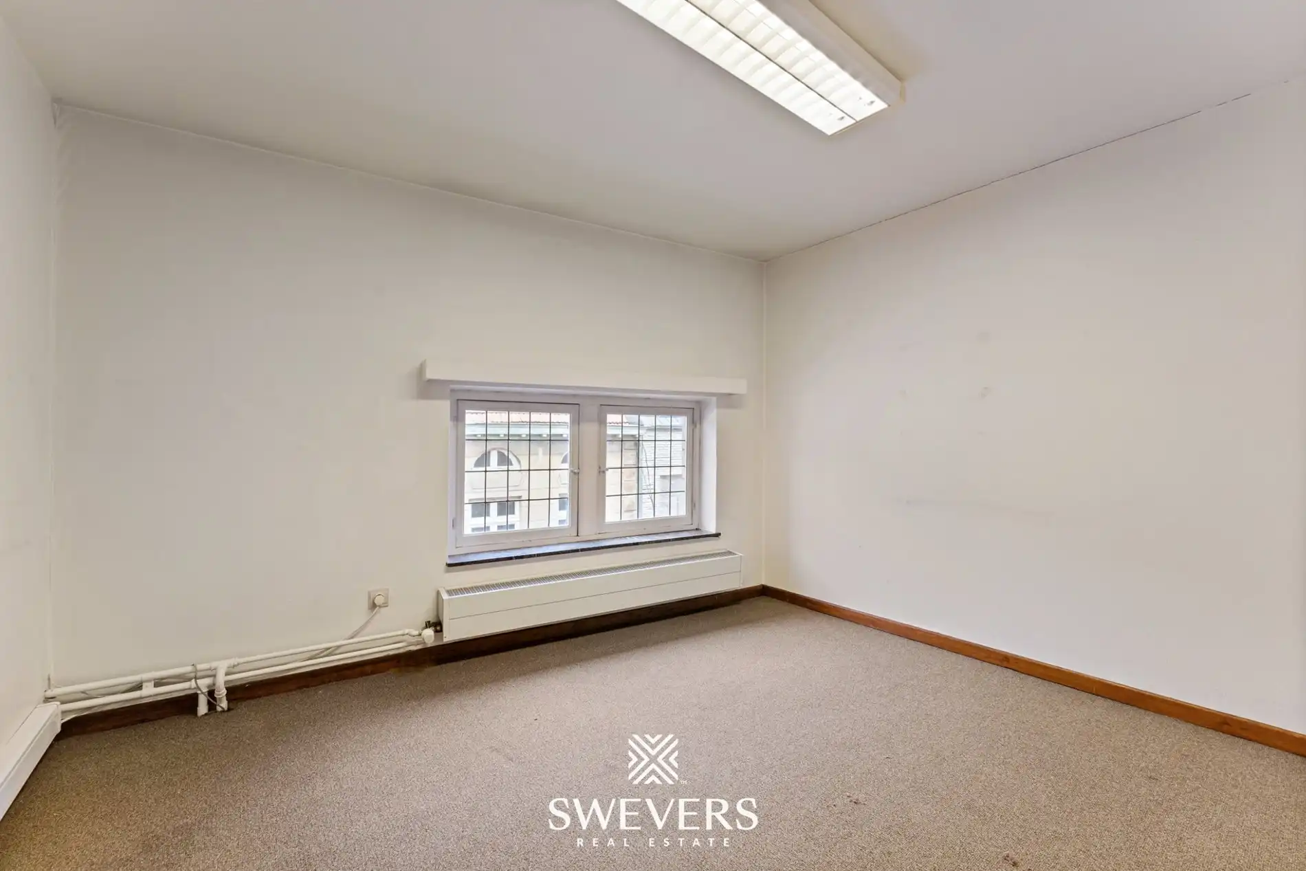 Authentiek pand (°1850) ruim duplex appartement met handelsruimte foto 22