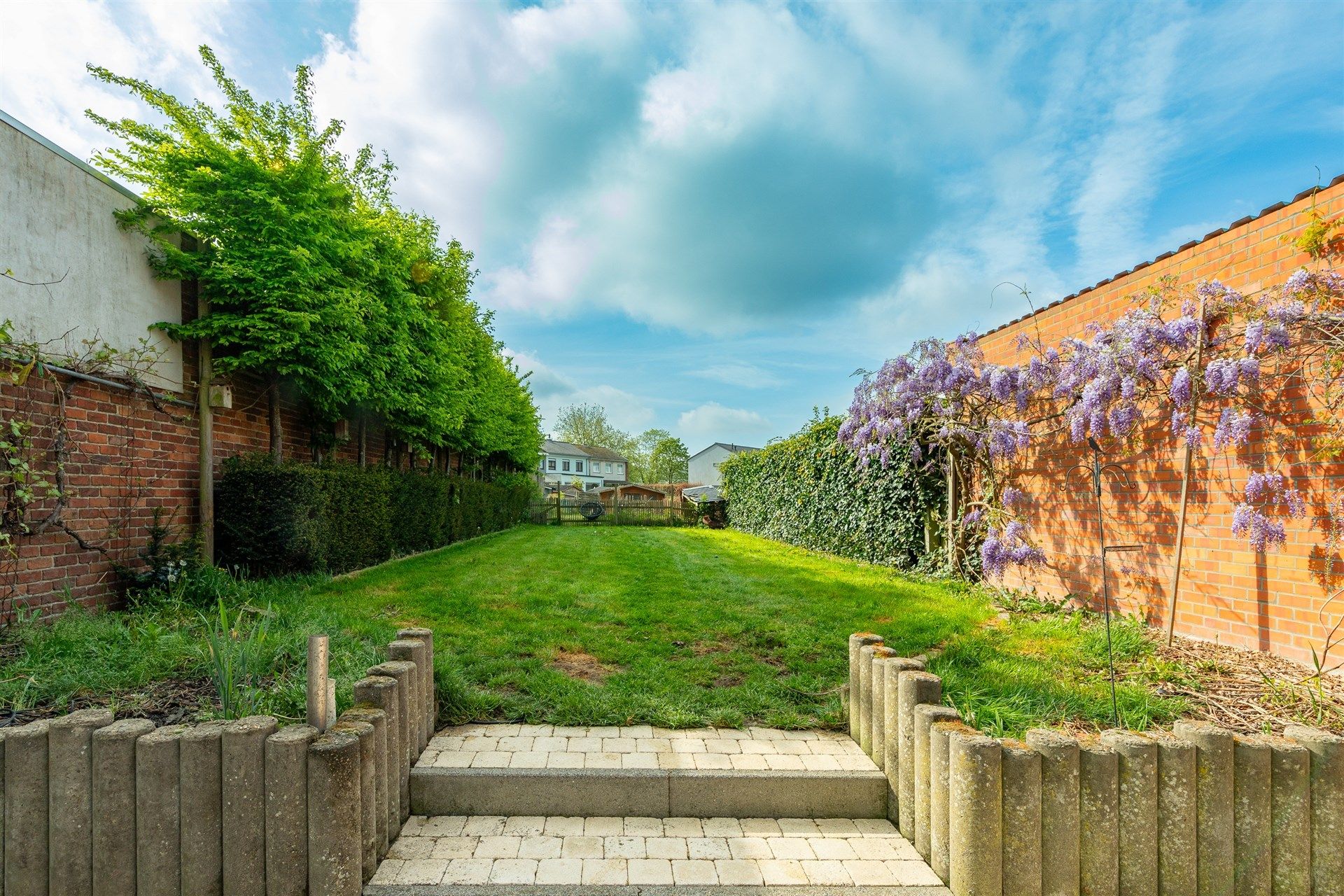 Bijzonder ruime woning met diepe tuin in Wetteren centrum foto 19