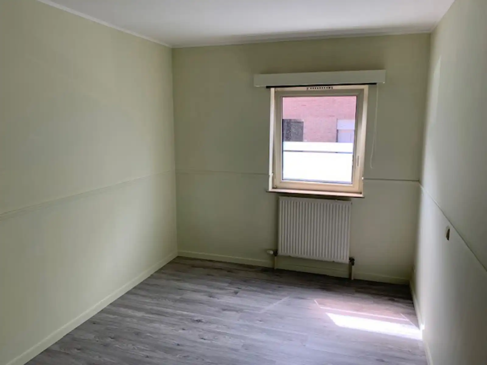 Gelijkvloers 1 slaapkamerappartement foto 6