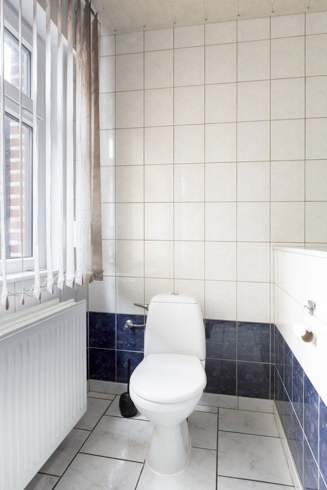 Halfopen gezinswoning met drie slaapkamers (mogelijkheid tot 4), grote tuin en zonnepanelen! foto 22