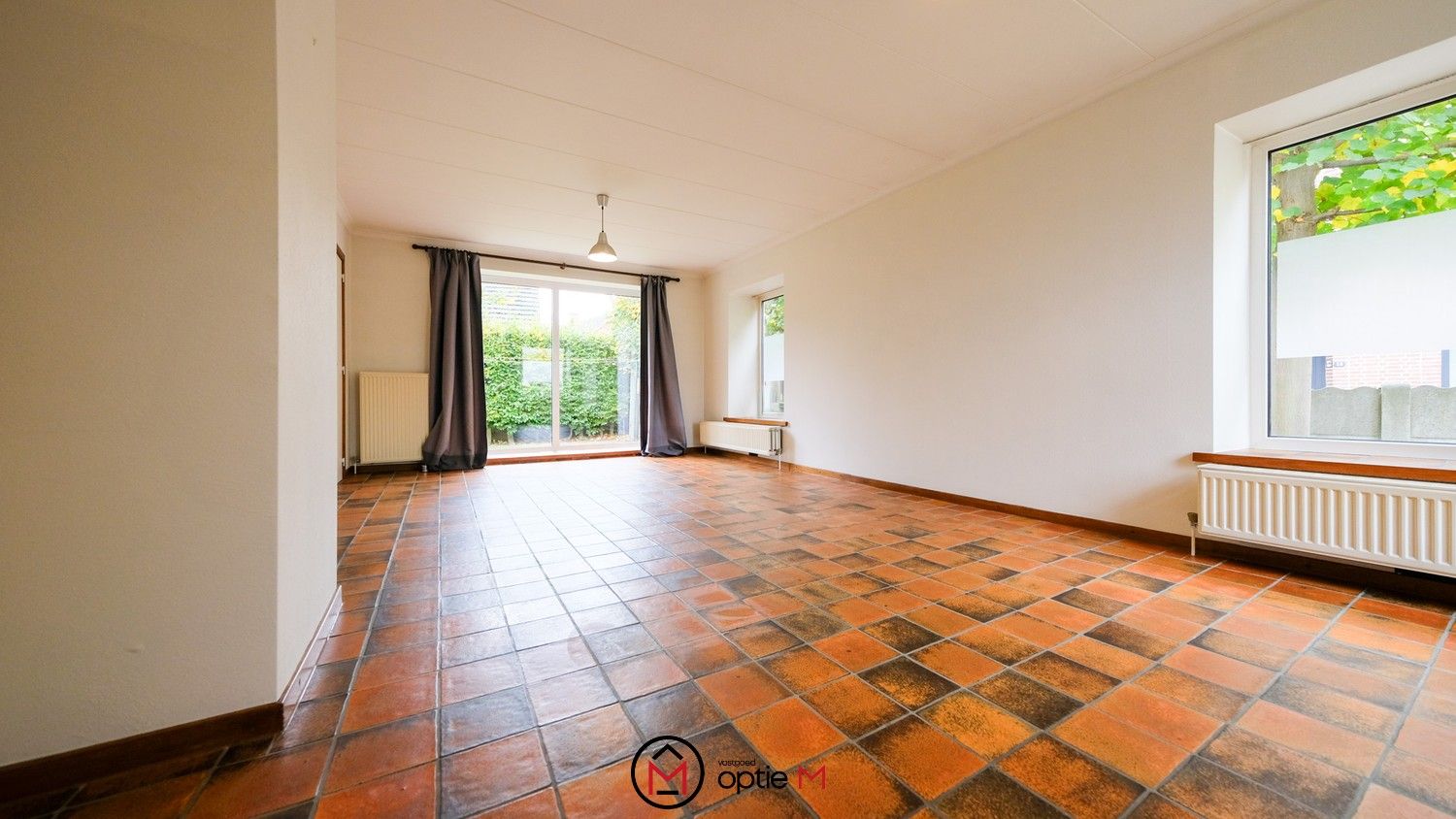 Halfopen woning te huur met tuin en garage in Bilzen foto 2