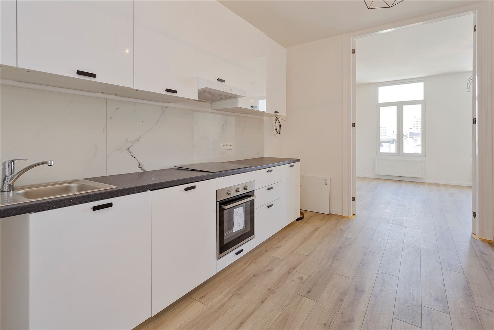  2slpk appartement aan de poorten van de Dageraadplaats foto 5