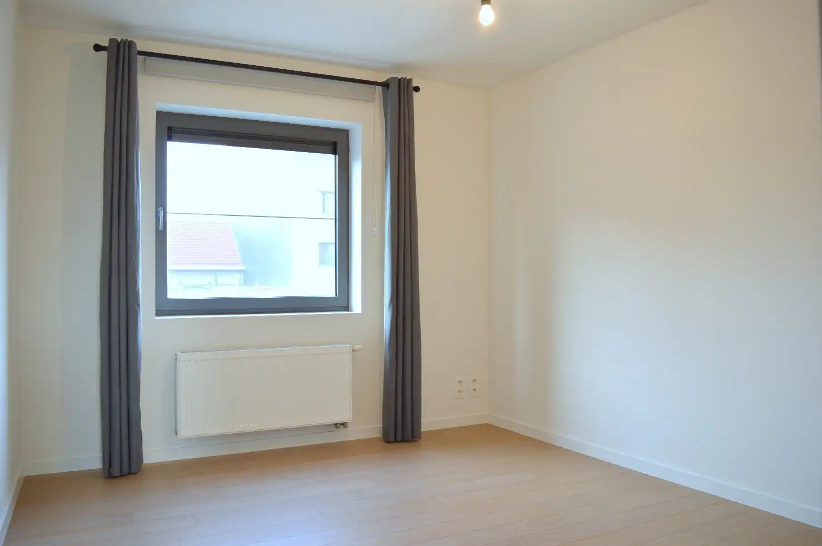 Ruim instapklaar appartement met 3 slaapkamers en autostaanplaats te koop nabij centrum Harelbeke foto 9