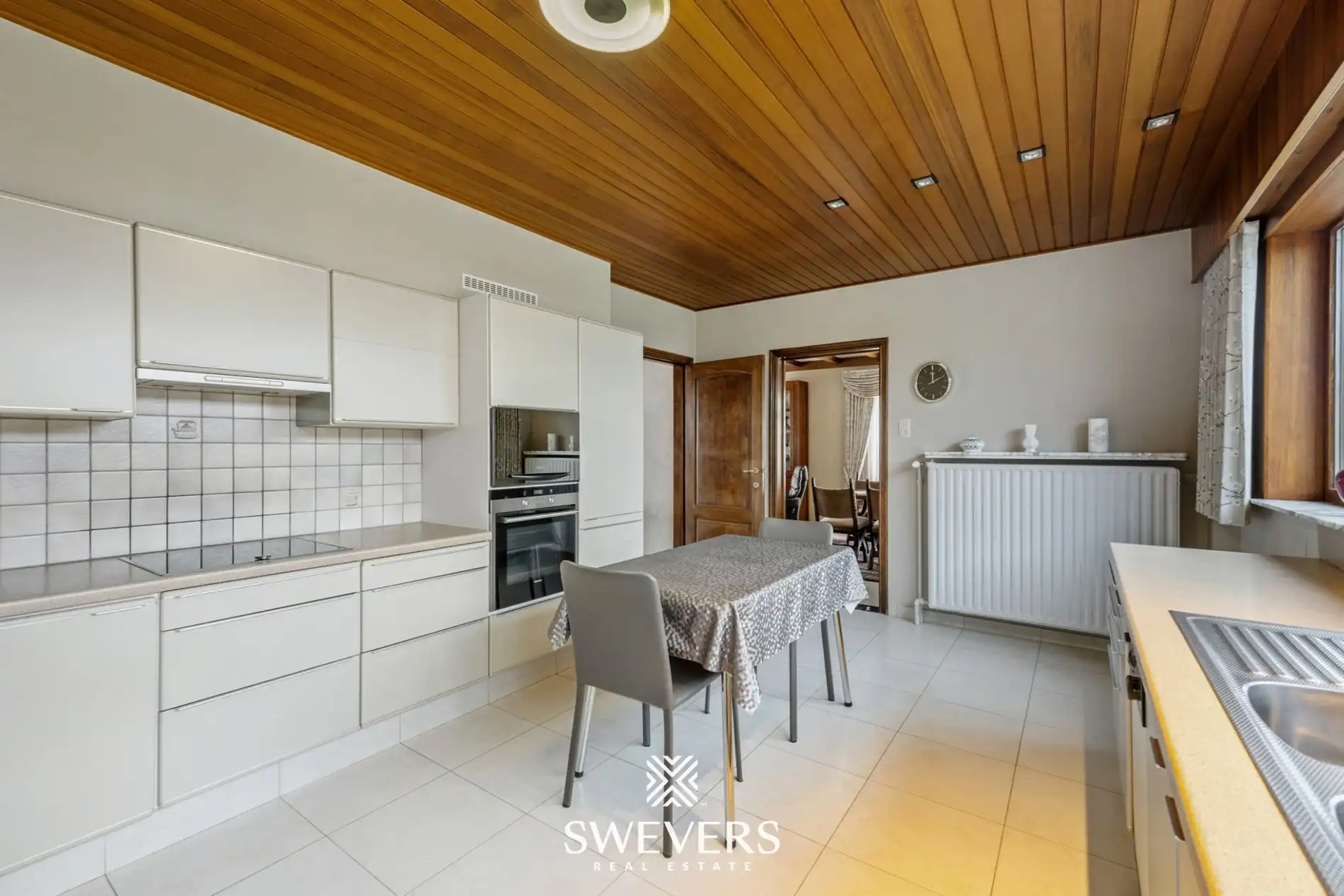 Leuke gezinswoning (4 slpk) met veel potentieel op zonovergoten perceel van 15a 84ca in doodlopende straat te Boekt foto 5