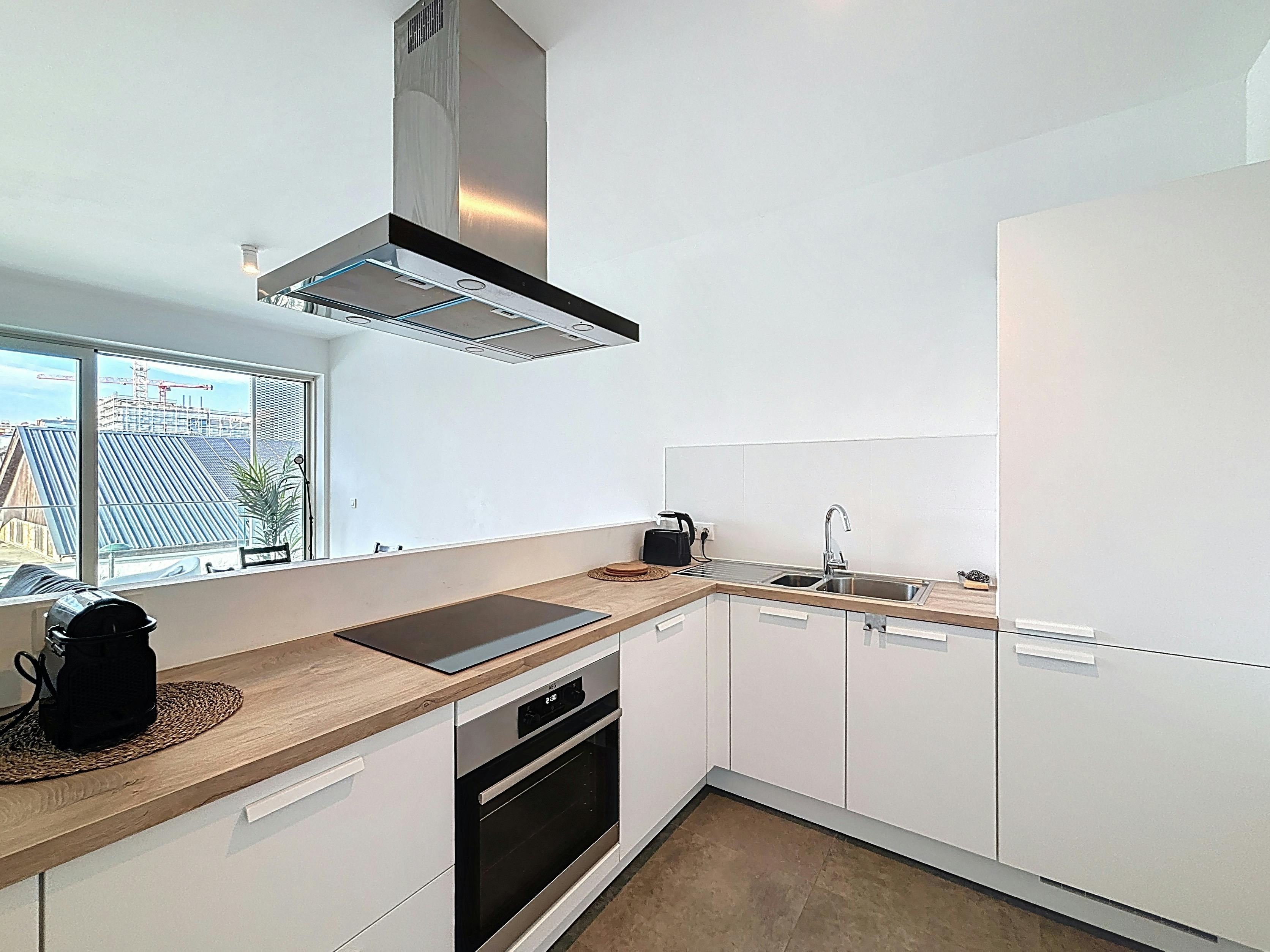 Gemeubileerd appartement te huur in hartje Brussel foto 9