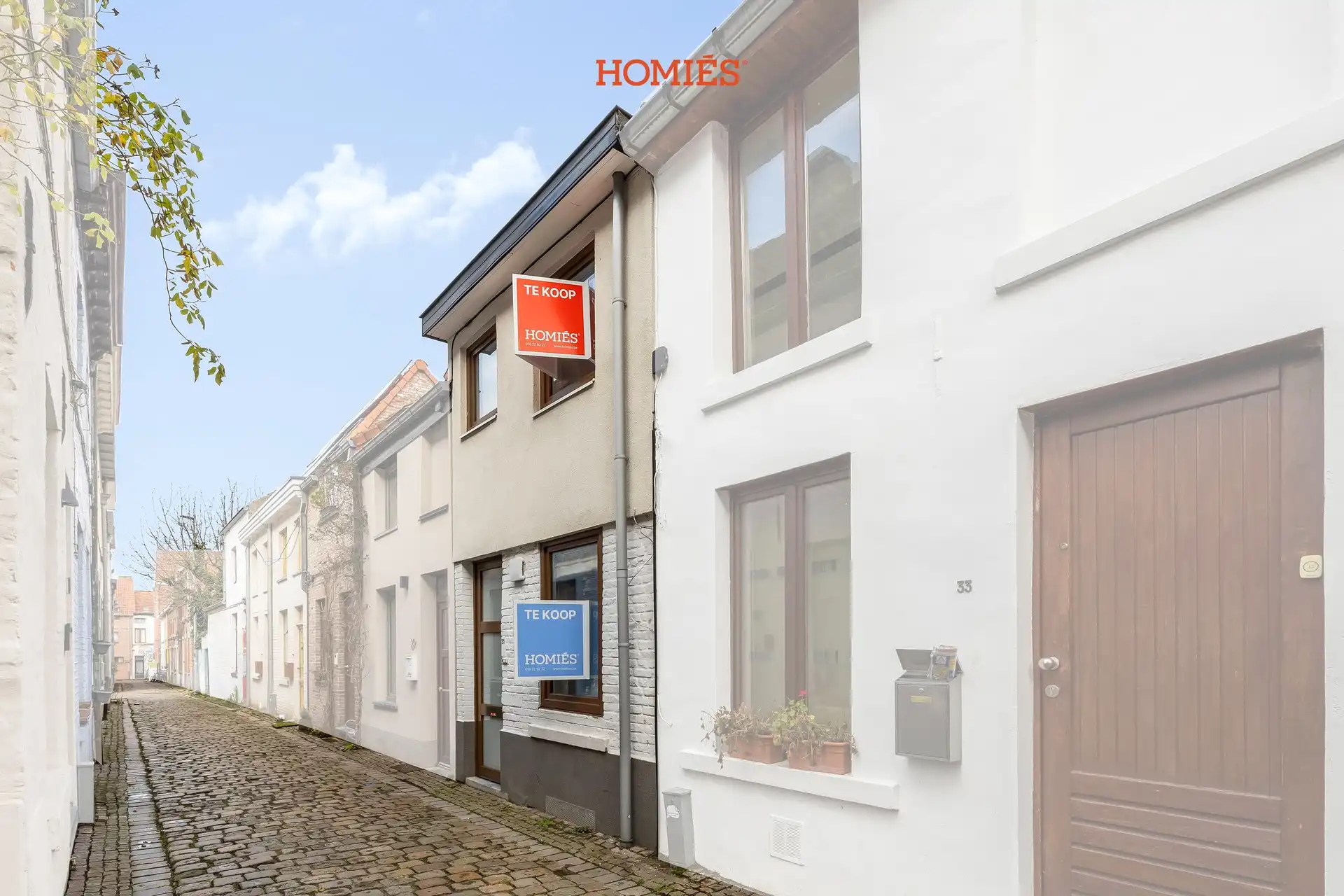 Charmante stadswoning met 3 slaapkamers en zonnig terras foto {{pictureIndex}}