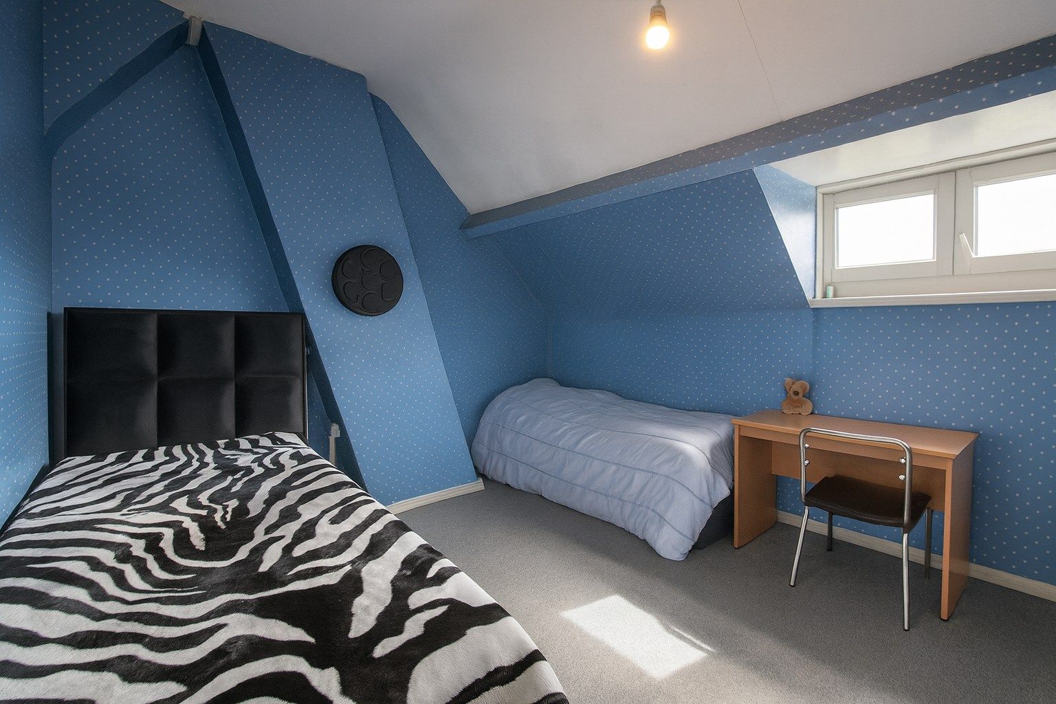 Te koop: Charmante rijwoning met diepe tuin in hartje Sint-Niklaas! foto 9