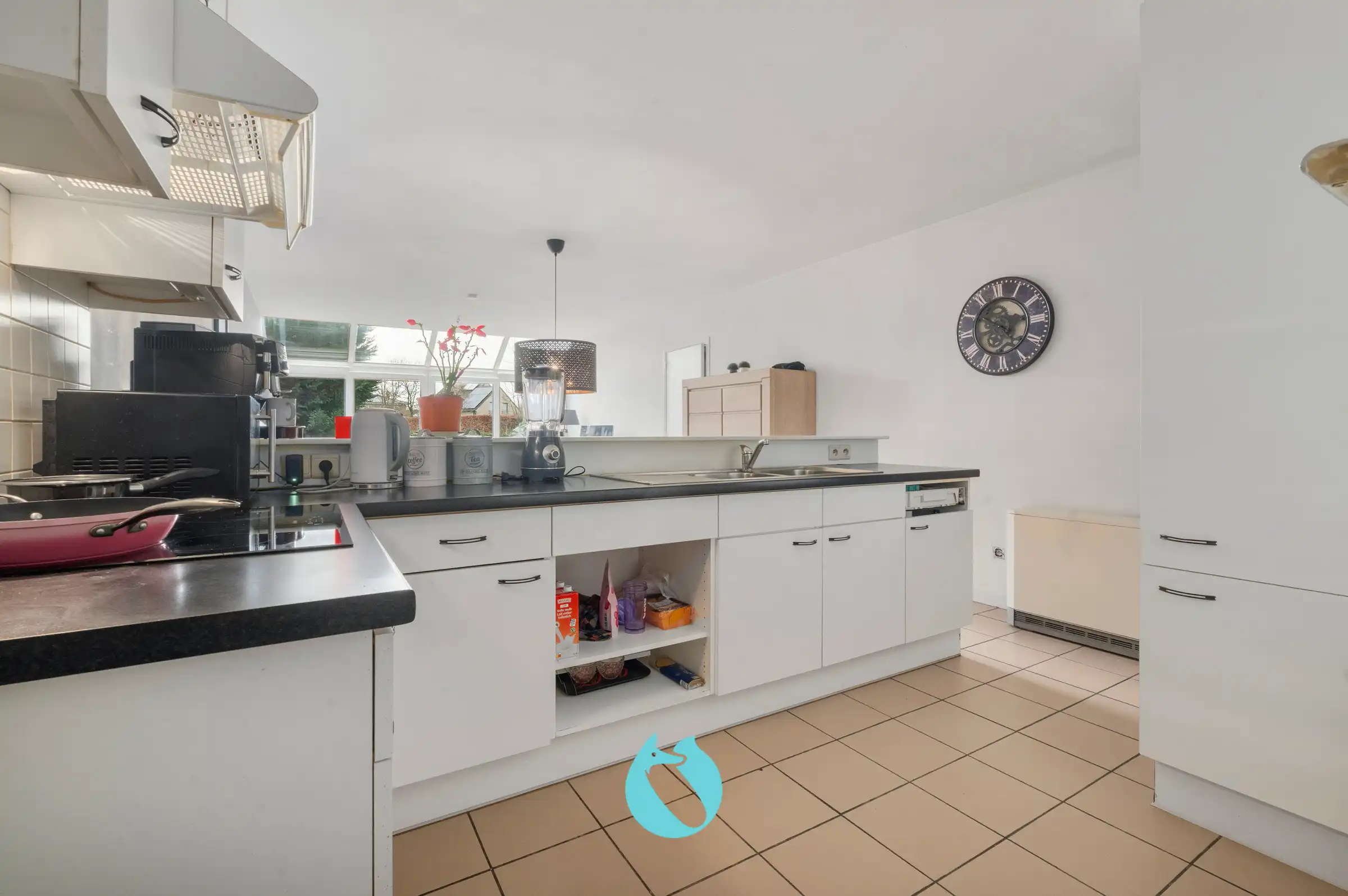 Gelijkvloers appartement met 2 slpks, tuin en garage foto 5