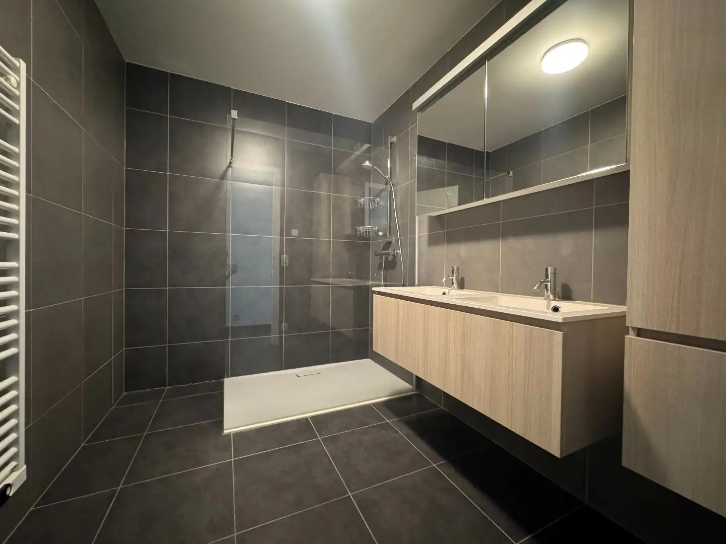 Te huur in Merchtem: ruim appartement 2 slpk + 2 autostaanplaatsen + kelder foto 15
