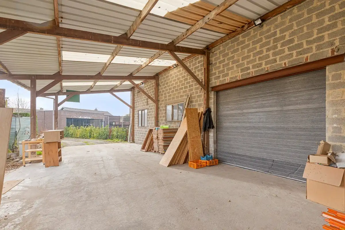 Te renoveren rijwoning met achterliggend groot magazijn! foto 17